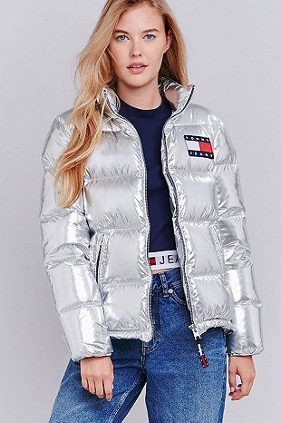 Gigi Hadid cuts a stylish figure in silver Tommy Hilfiger jacket